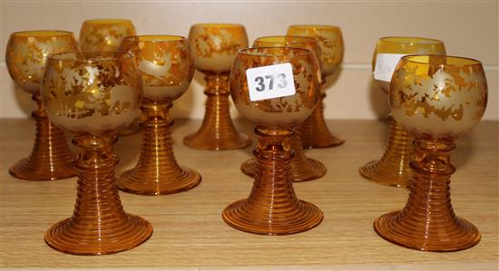 Ten amber glass roemers